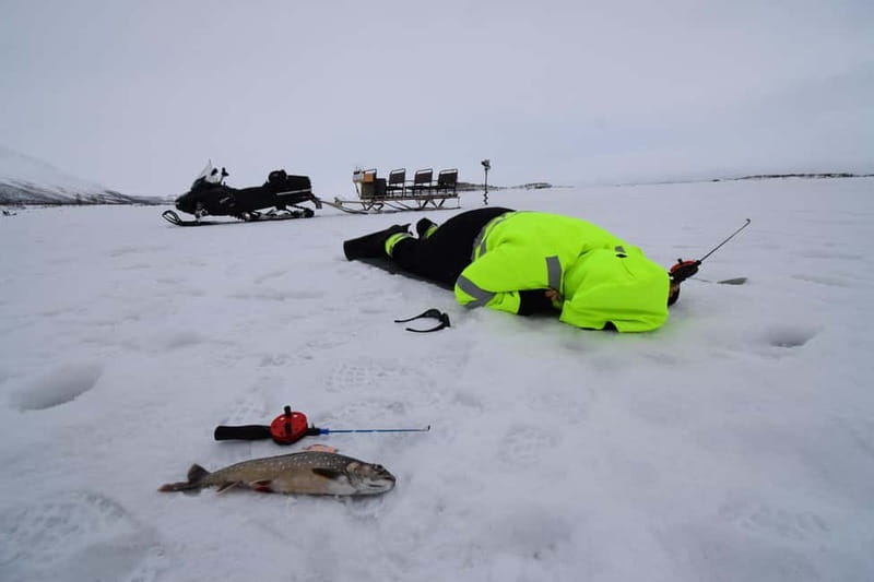 Abisko: Ice Fishing Experience - Learning to Drill Through the Ice