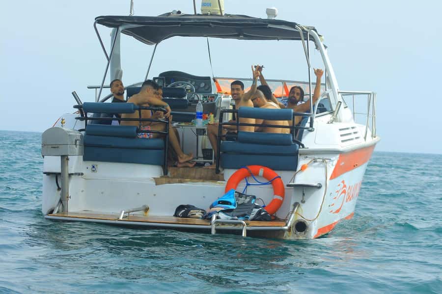 Agadir: Boat Tour with Lunch, Fishing & Jetski - Swimming from the boat in a quiet coastal spot
