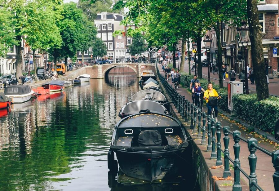 Amsterdam: Urban Bike Tour, Graffiti Art & Magnet Fishing - A second ferry and the ride through Jordaan