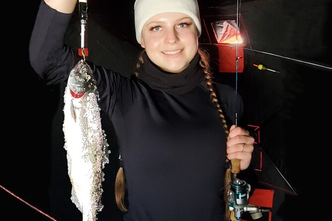Anchorage Ice Fishing Adventure with transportation - Learning to fish through the ice