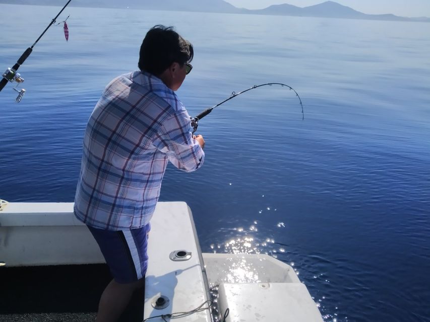 Athens: Fishing Trip Experience on a Boat with Seafood Meal - Swimming stops and time on the water