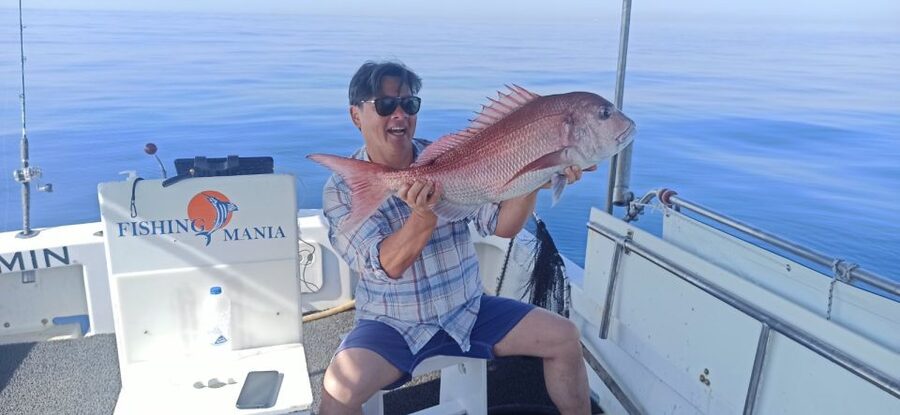 Athens: Fishing Trip Experience on a Boat with Seafood Meal - Learning to fish with Captain Nektarios