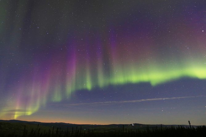 Aurora Ice Fishing - Waiting for the Northern Lights outside