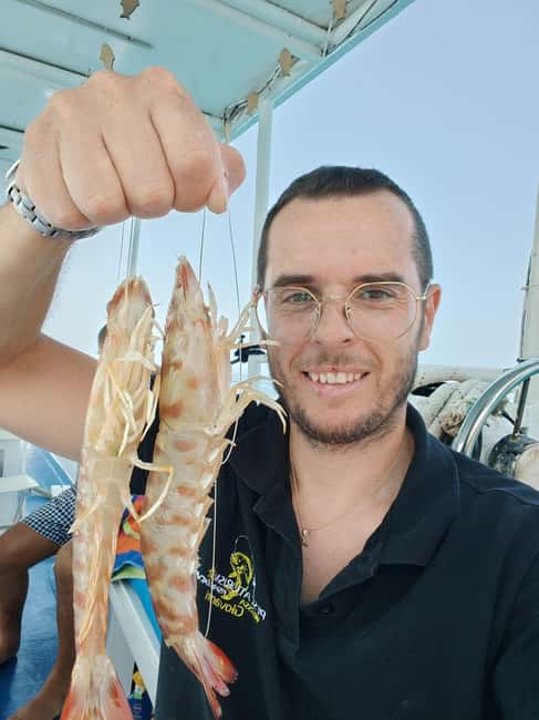 Cefalù: boat trip with fishing, coastal tour, snorkeling, and lunch on board - Starting at Via Presidiana with a fisherman’s welcome
