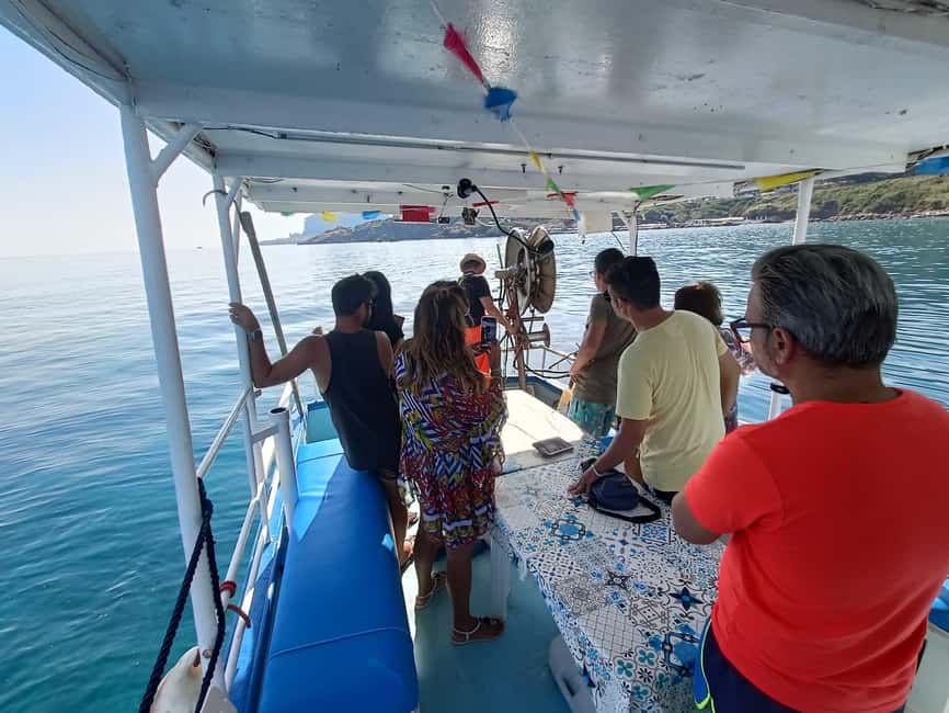 Cefalù: boat trip with fishing, coastal tour, snorkeling, and lunch on board - Swimming and snorkeling at Santa Lucia cove