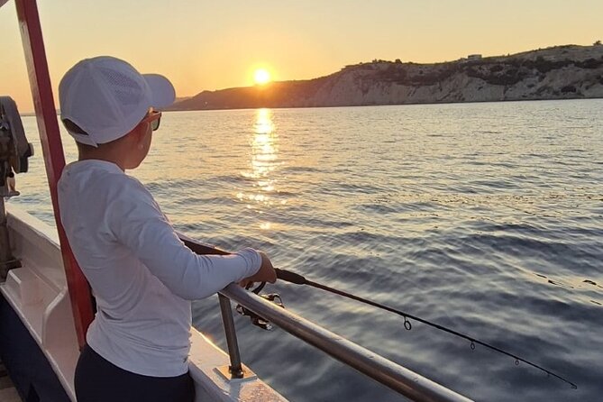 Chania Sunset Rod Fishing Experience - Swimming when the fishing slows