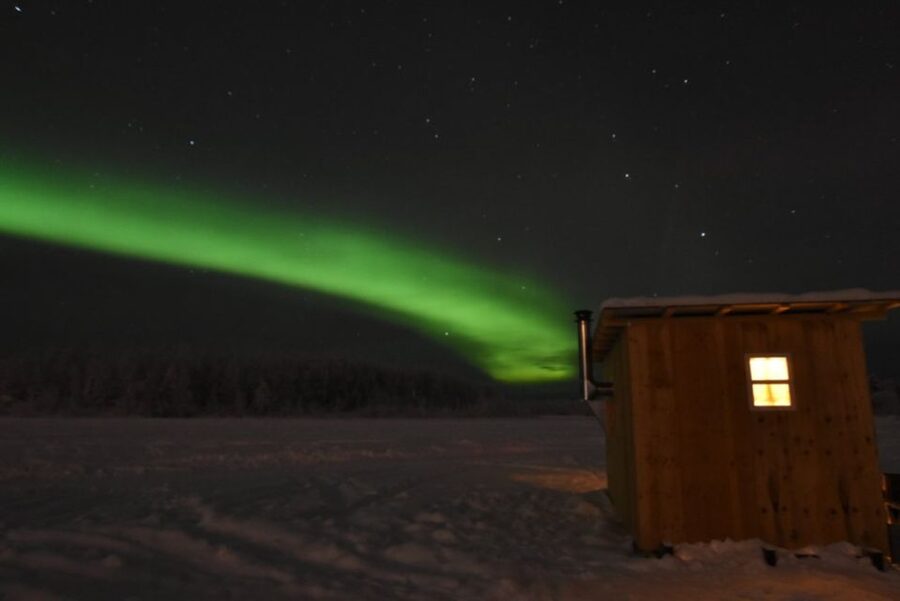 Chena Lake: Aurora Borealis Viewing & Ice Fishing Adventure - Fishing for salmon, trout, char, and grayling