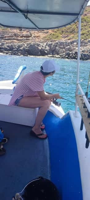 Crete: Boat Cruise with Fishing, Swimming, Lunch, and Drinks - Snorkeling and swim stops in clear water