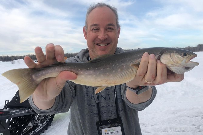Fairbanks Ice Fishing Expedition in a Heated Cabin with Fish Cookout - Stepping outside for the classic Alaskan version