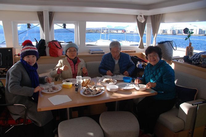 Fishing Trip with Luxury Catamaran in Tromso - A warm saloon, coffee, and the ride to the fishing area