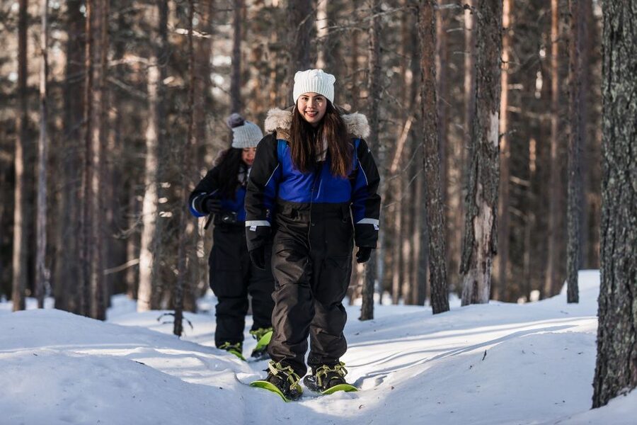 From Rovaniemi: Snowshoeing and Ice Fishing Tour - Crossing the frozen lake for ice fishing