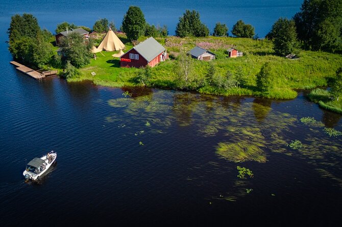 Guided Midnight Sun Fishing and Sightseeing Boat Tour - Making an open fire on an island