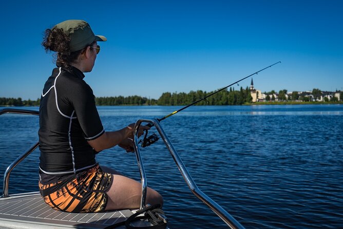 Guided Midnight Sun Fishing and Sightseeing Boat Tour - Ounasvaara Hill and Rovaniemi’s church
