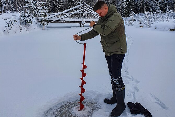 Half-Day Husky Safari and Salmon Ice Fishing Experience - Fishing for salmon through the ice