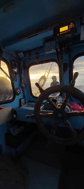 Hersonissos: Agapi Fishing Trips Sunset Cruise - Drinks, raki, and the return to port