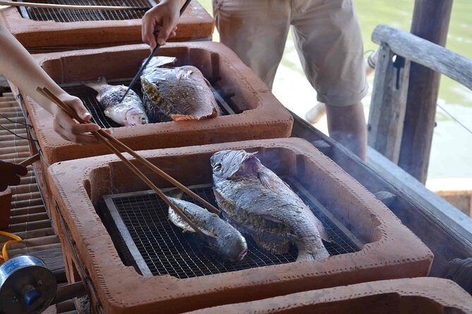 Hoi An basket boat tour with seafood lunch at fishing family - A bamboo house beside the river