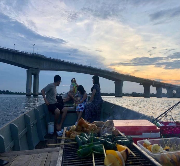 Hoi An: Sunset BBQ Fishing tour with Locals by Boat Cruise - A gentle cruise through Hoi An’s working river country