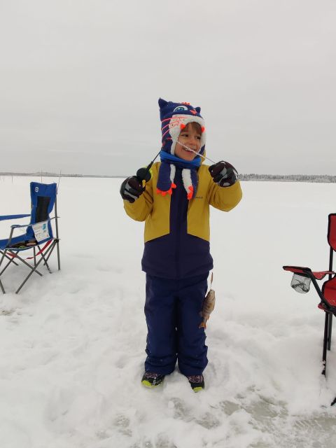 Ice Fishing Adventure in Levi with Salmon Soup - Salmon soup, cookies, and a crackling fire