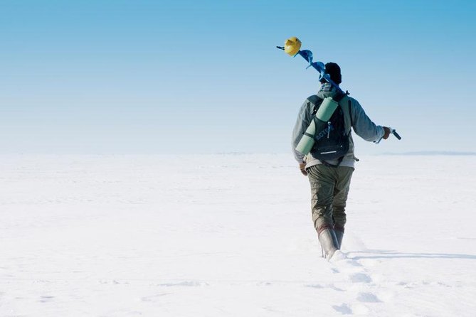 Ice Fishing and Husky - A quiet change of pace on the frozen lake