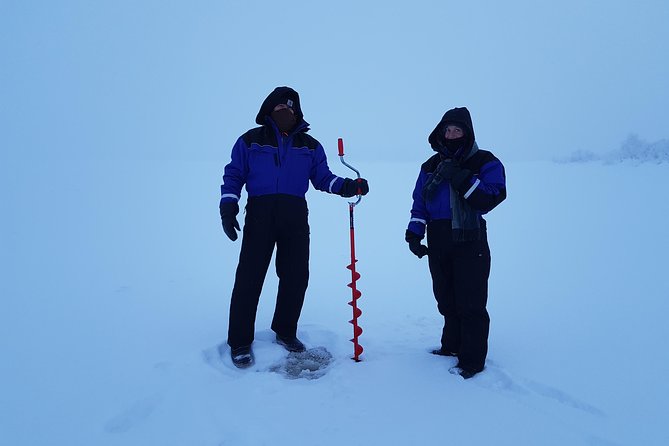 Ice fishing by car with hot beverages at Pyhä-Luosto - A gentle introduction to ice fishing in Lapland
