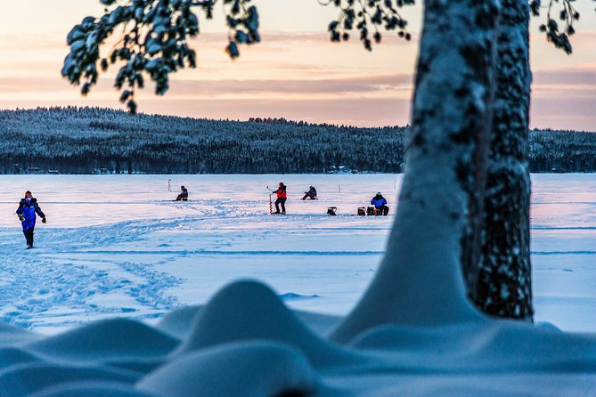 Ice Fishing Trip in Rovaniemi - Drilling holes and learning the small tricks