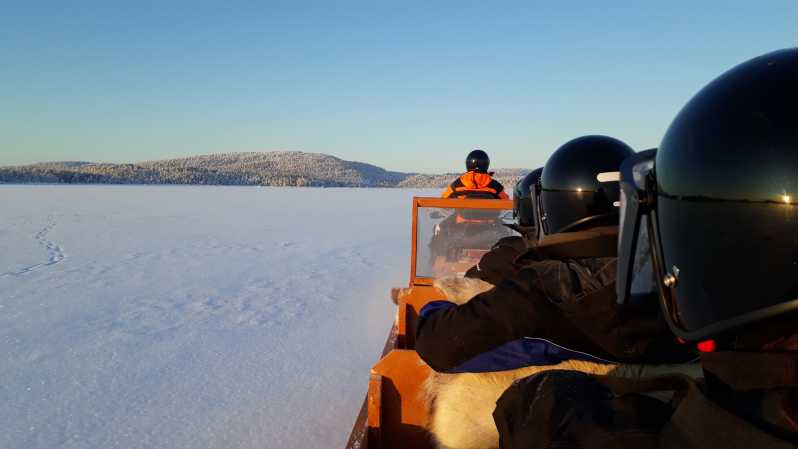 Ivalo: Ice Fishing Tour to Lake Inari, Reindeers & Lunch - Learning ice fishing through the frozen lake