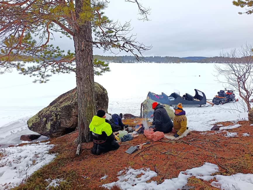 Ivalo: Ice Fishing trip to Lake Inari - Setting up your ice fishing hole