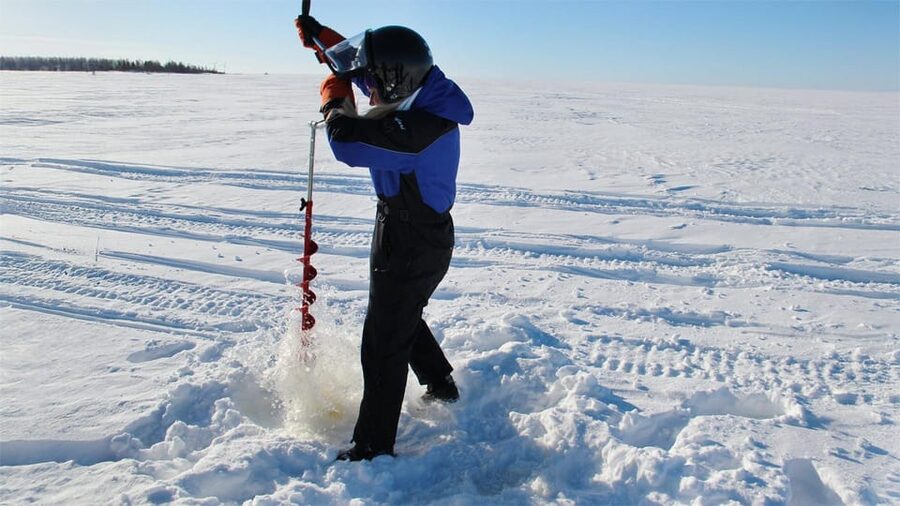 Kemi-Tornio: Ice Fishing Safari with Snowmobiles - Taking the snowmobile across frozen Bothnian Bay