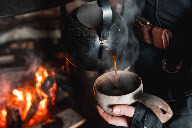 Lappish Lunch Break -Snowmobiling, ice fishing and tasty food - Guides who shape the experience