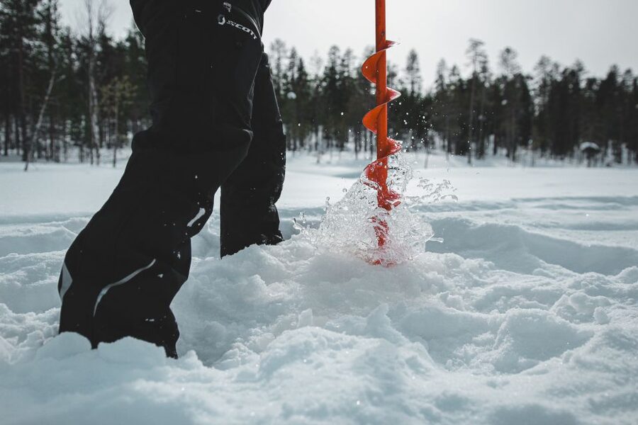 Levi: Finnish Ice Fishing Tour by Car - A warm car ride through Lapland