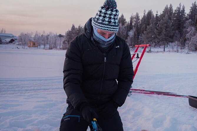 Levi Ice Fishing Experience in the Wild with Campfire Treats - Ice sculptures and the cabin experience