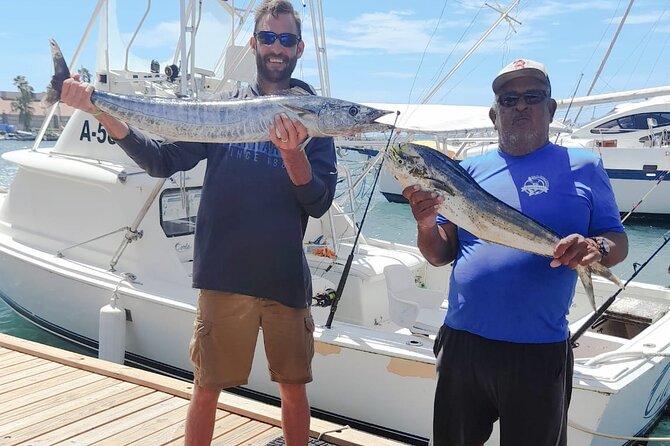 Private Afternoon Fishing Charter in Aruba - The crew: strong fishing help, mixed people skills