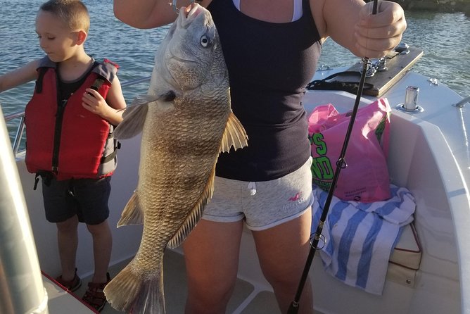 Private Fishing Boat Charters in Naples Bay and the Gulf - Family comfort on an open 22-foot boat
