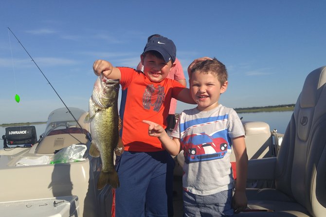 Private Pontoon Fishing Charter on Lake Tohopekaliga in FL - A calm start from Big Toho Marina