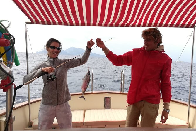 Private tour with fishing, tour of Capri and lunch on board - Coastal stories from Massa Lubrense to Punta Campanella