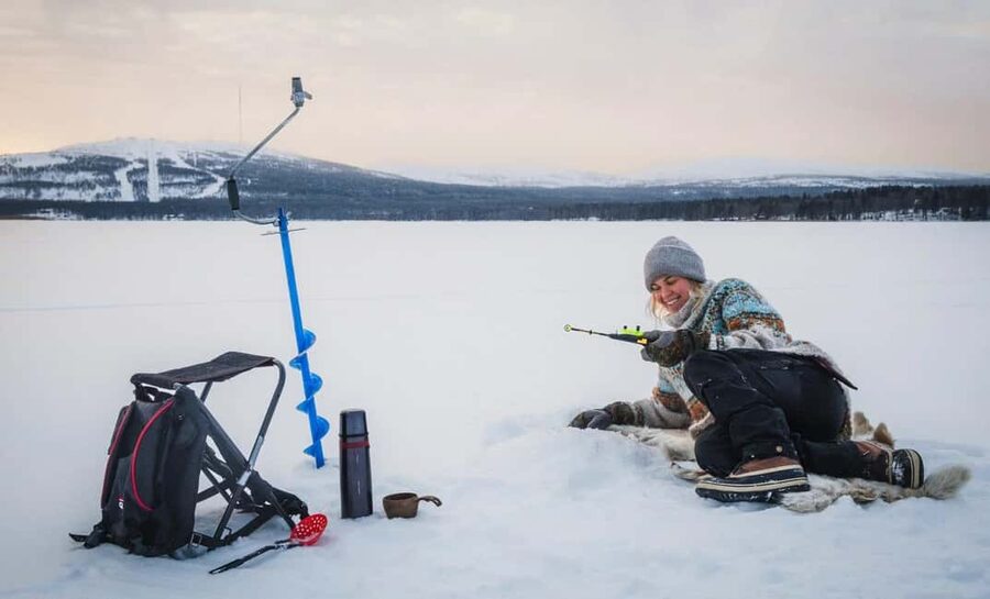 Pyhä: Ice Fishing Experience at Frozen Lake - Waiting for perch, white fish, or trout