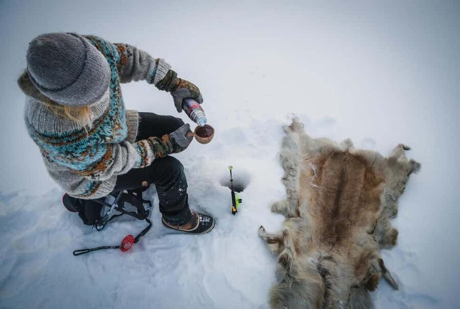 Pyhä: Ice Fishing Experience at Frozen Lake - Staying warm in Finnish winter
