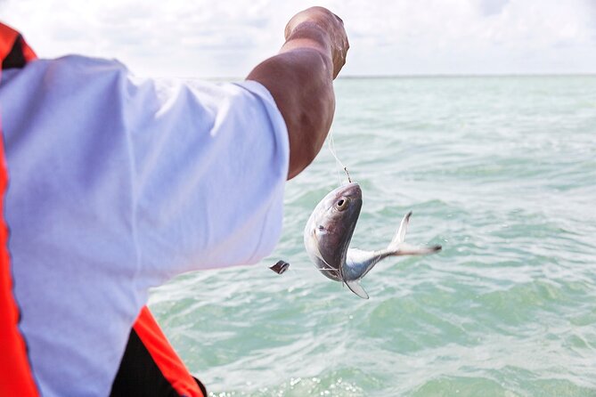 Relaxing private boat tour to Cabo Catoche with fishing - Cuevones and its shallow snorkeling water