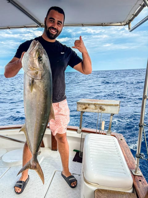 Rhodes: Captain Manolis Fishing Trip with BBQ and Swimming - The onboard barbecue and the 500-gram fish portion