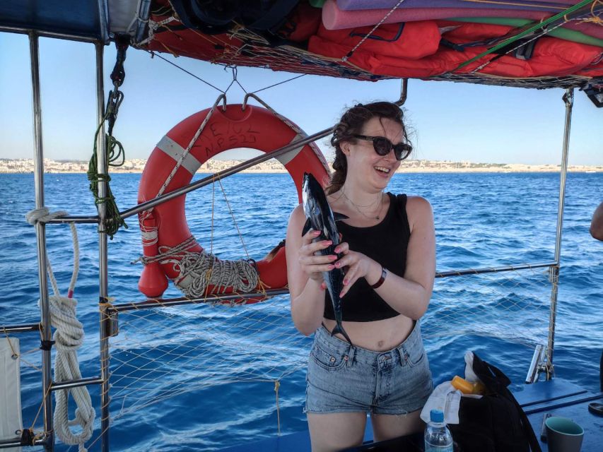 Rhodes: Fishing Trip, Snorkelling, BBQ, & Professional Guide - Lunch from the boat’s handmade BBQ