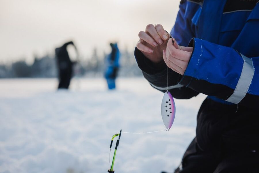 Rovaniemi: Arctic Circle Ice Fishing Experience - Drilling the ice and learning the old method