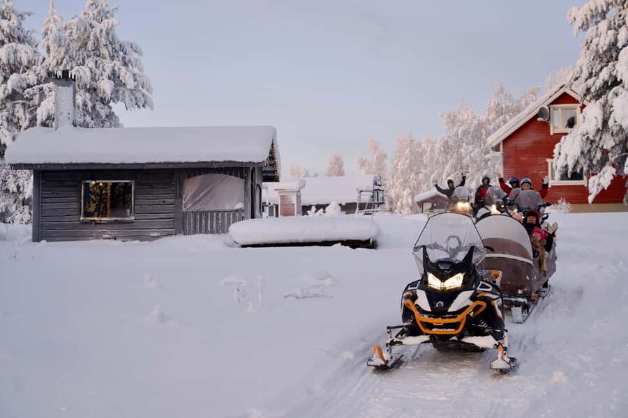 Rovaniemi: Ice Fishing and Snowmobile Tour with Snacks - Getting ready for the snowmobile ride