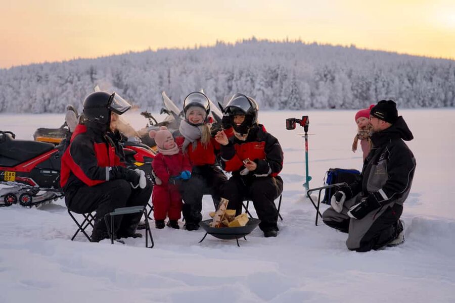 Rovaniemi: Ice Fishing and Snowmobile Tour with Snacks - Meeting the StayLapland minivan