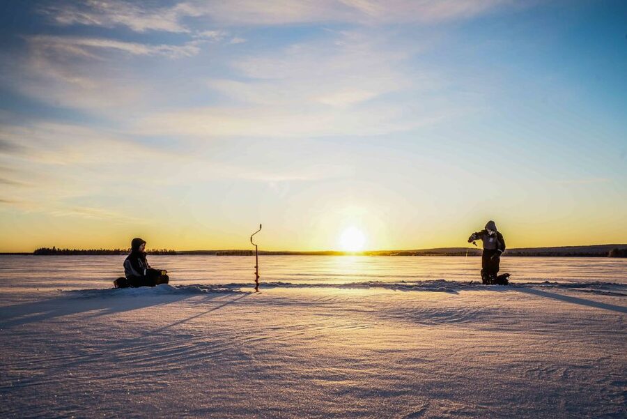 Rovaniemi: Ice Fishing on a Frozen Lake with BBQ and Photos - Learning the basics of ice fishing