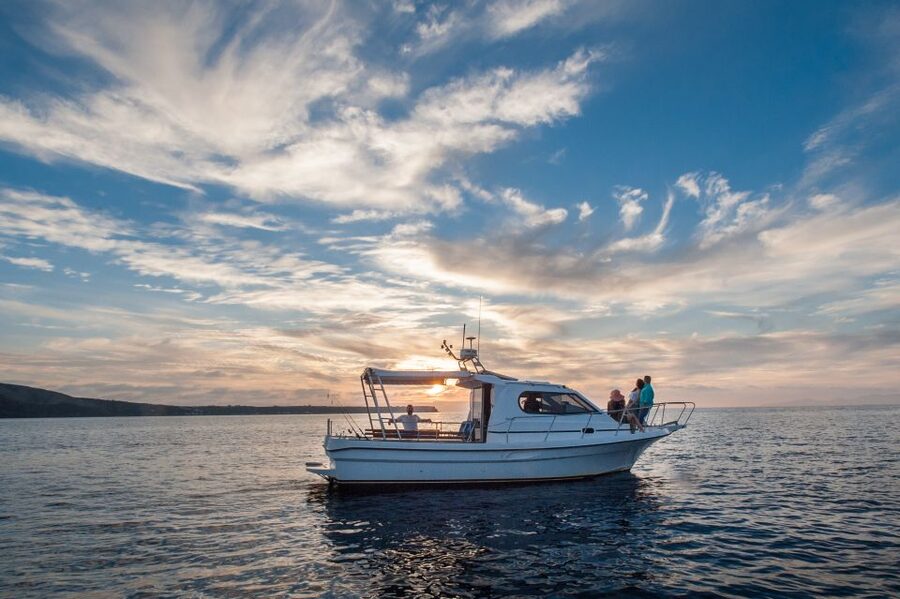 Santorini Private Cruise boat fishing tour - BBQ, Snorkeling - Secluded beaches, clear water, and snorkeling stops