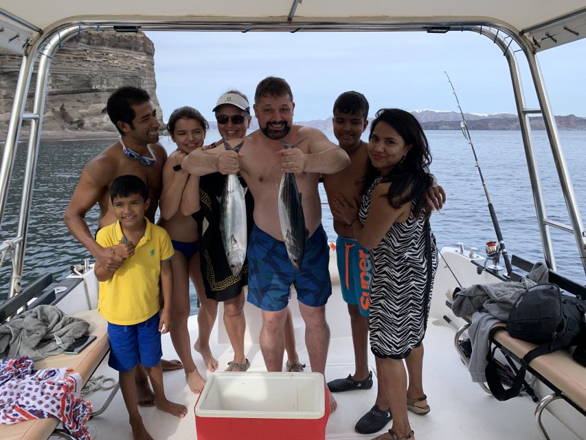 Santorini Private Cruise boat fishing tour - BBQ, Snorkeling - Watching the Oia sunset from a fishing boat