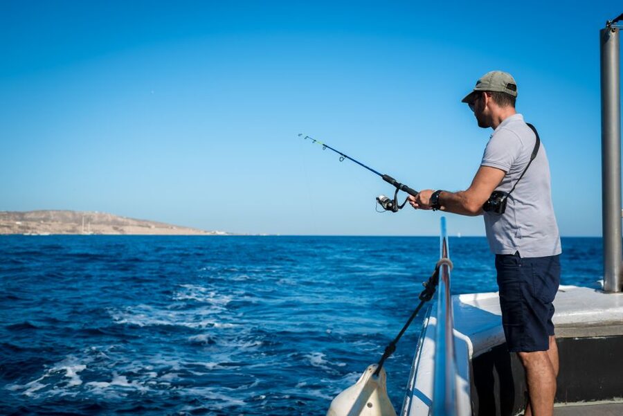 Santorini Sunset Fishing Trip with Dinner and Drinks - Swimming and Snorkeling in the Aegean