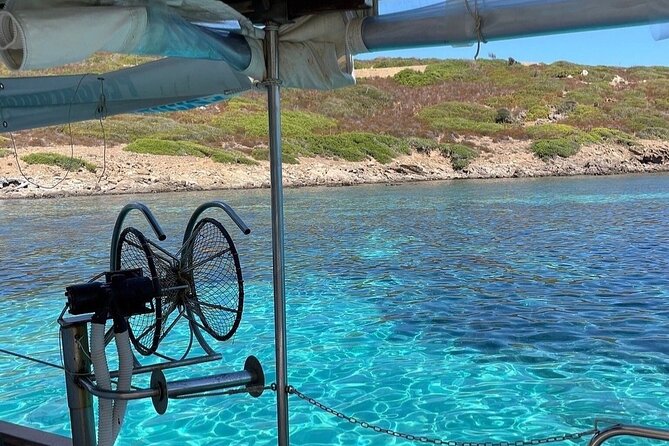 Snorkeling and Diving in the Gulf of Tavolara with Fishing - Tavolara’s cliffs and the coastal route