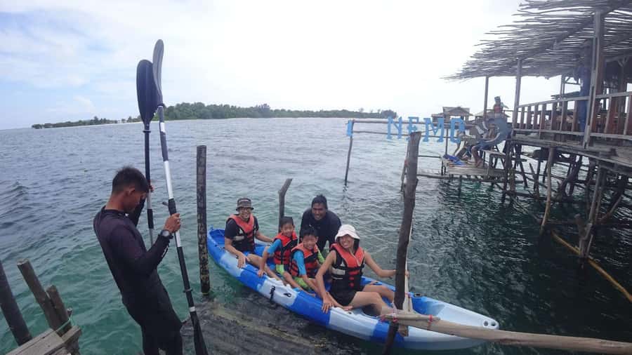 Snorkeling Kayaking Fishing Swimming Activities - Kayaking toward a white sand beach