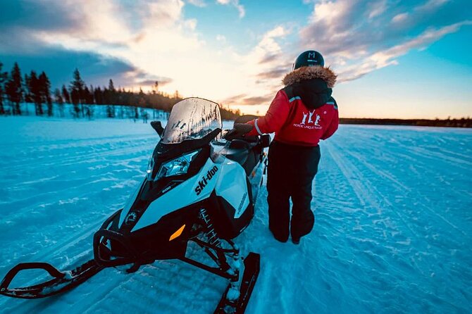 Snowmobile and Ice Fishing Experience - Pickup from central Rovaniemi and the winter clothing stop